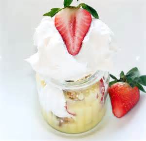vanilla pudding with strawberries and whipped cream